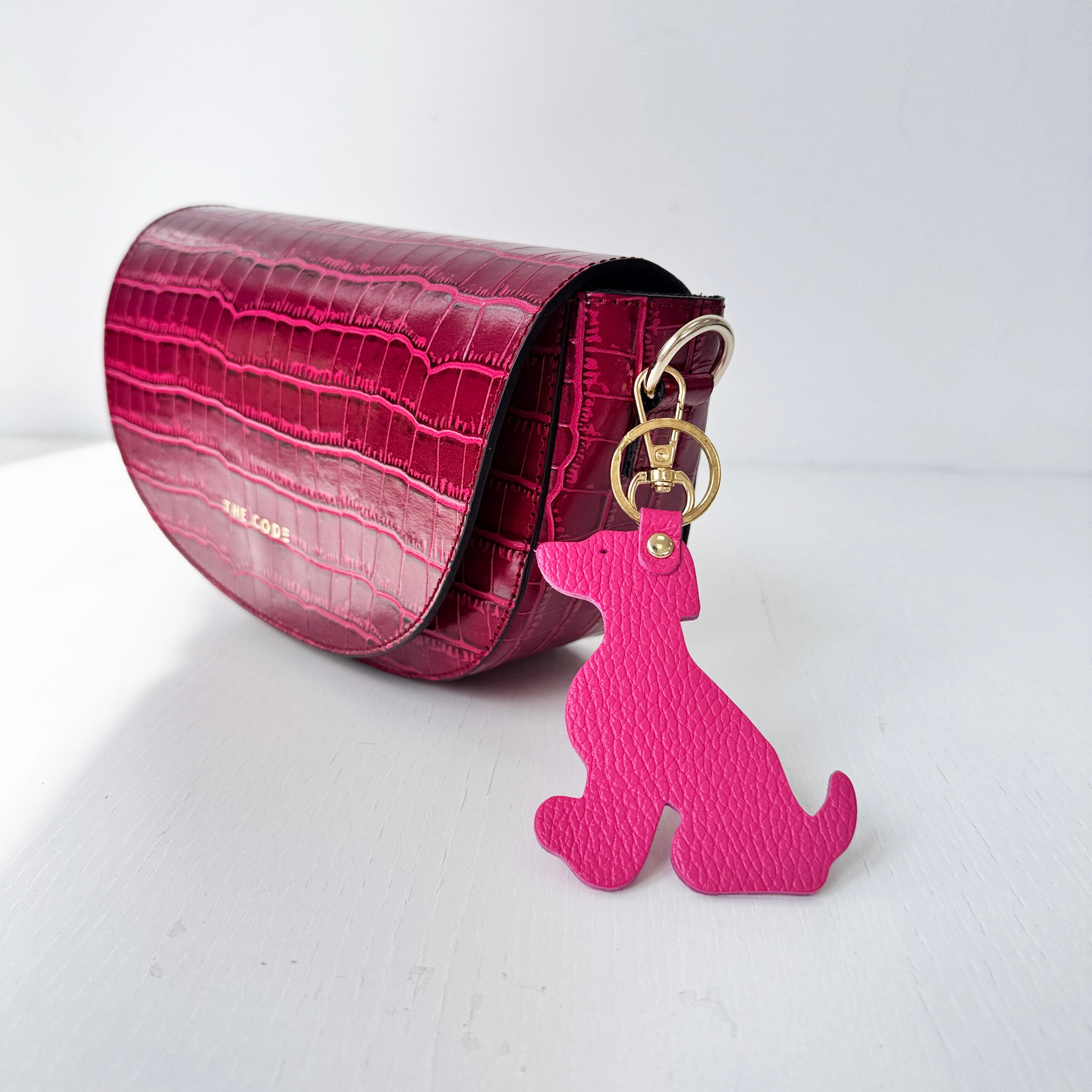 Charm llavero perro rosa